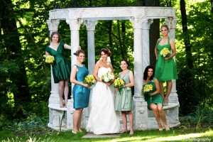 Bride and bridesmaids by gazebo, David Hartcorn Photography