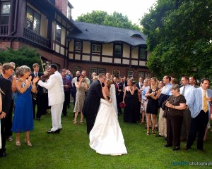 Bride and Groom Dancing Surrounded by Guests Outside Hamilton