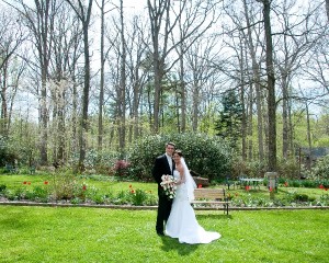 Bride and Groom in Garden Artistic Difference