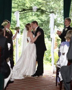 Bride and Groom Kissing After Ceremony