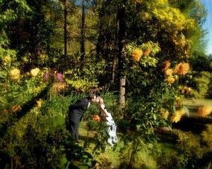 Bride and Groom Kissing in Garden
