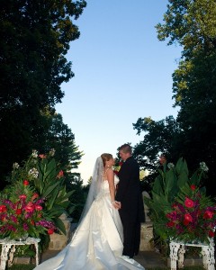 Bride and Groom Kissing in Garden Hamilton