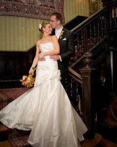 Bride and Groom Kissing on Stairwell