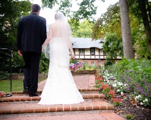 Bride and Groom Walking Up Steps