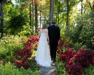 Bride and Groom Walking Up Walkway