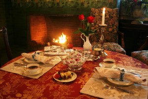 Candelit breakfast by dining room fireplace