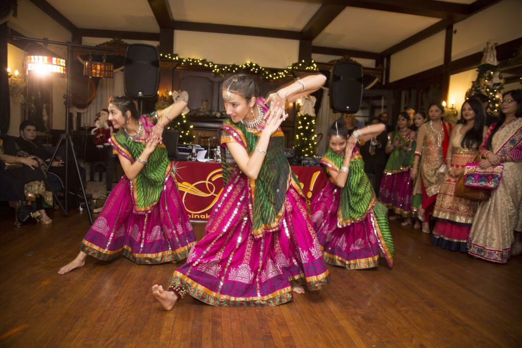 Traditional dancers at Indian wedding at Gramercy Mansion